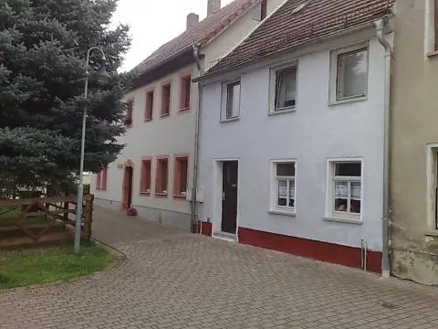 the house near the lake and swimming poo